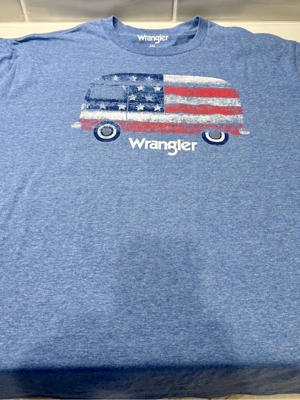 Wrangler Blue Graphic Tee with American Flag on a VW bus